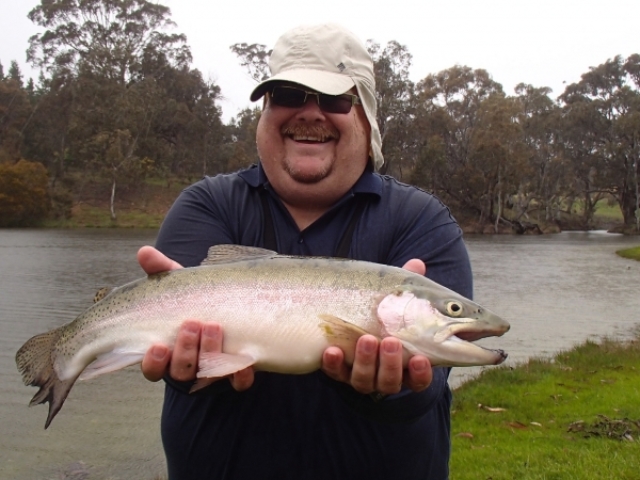 Fishing in the rain for large rainbow trout