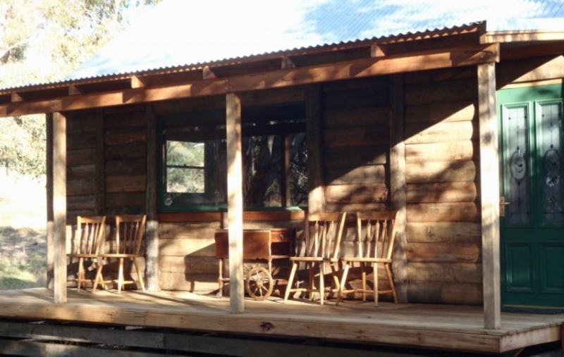 A verandah of timber slab hut