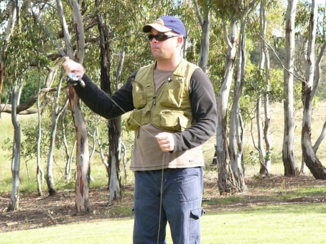 A man casting a fly rod