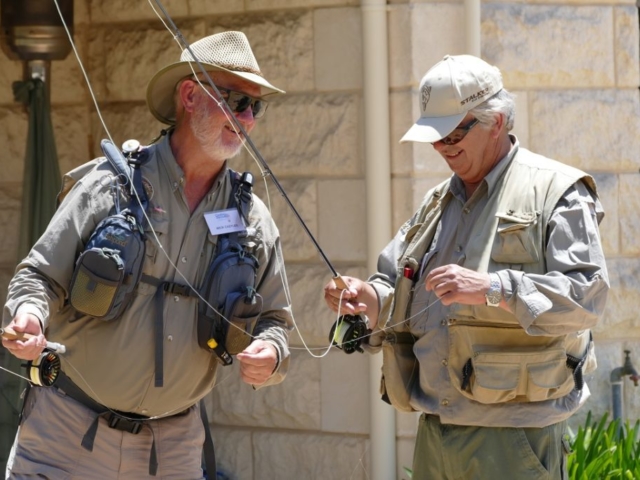 Two guys preparing to fly fish at Rainbow Springs Fly Fishing School