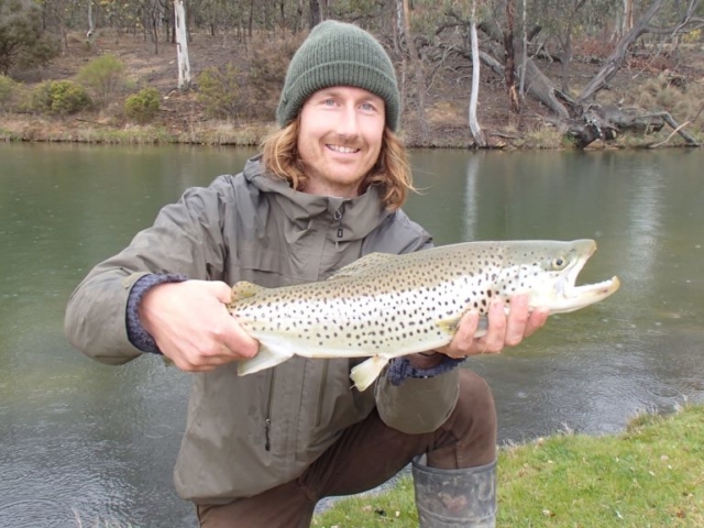 Catching big brown trout in the rain