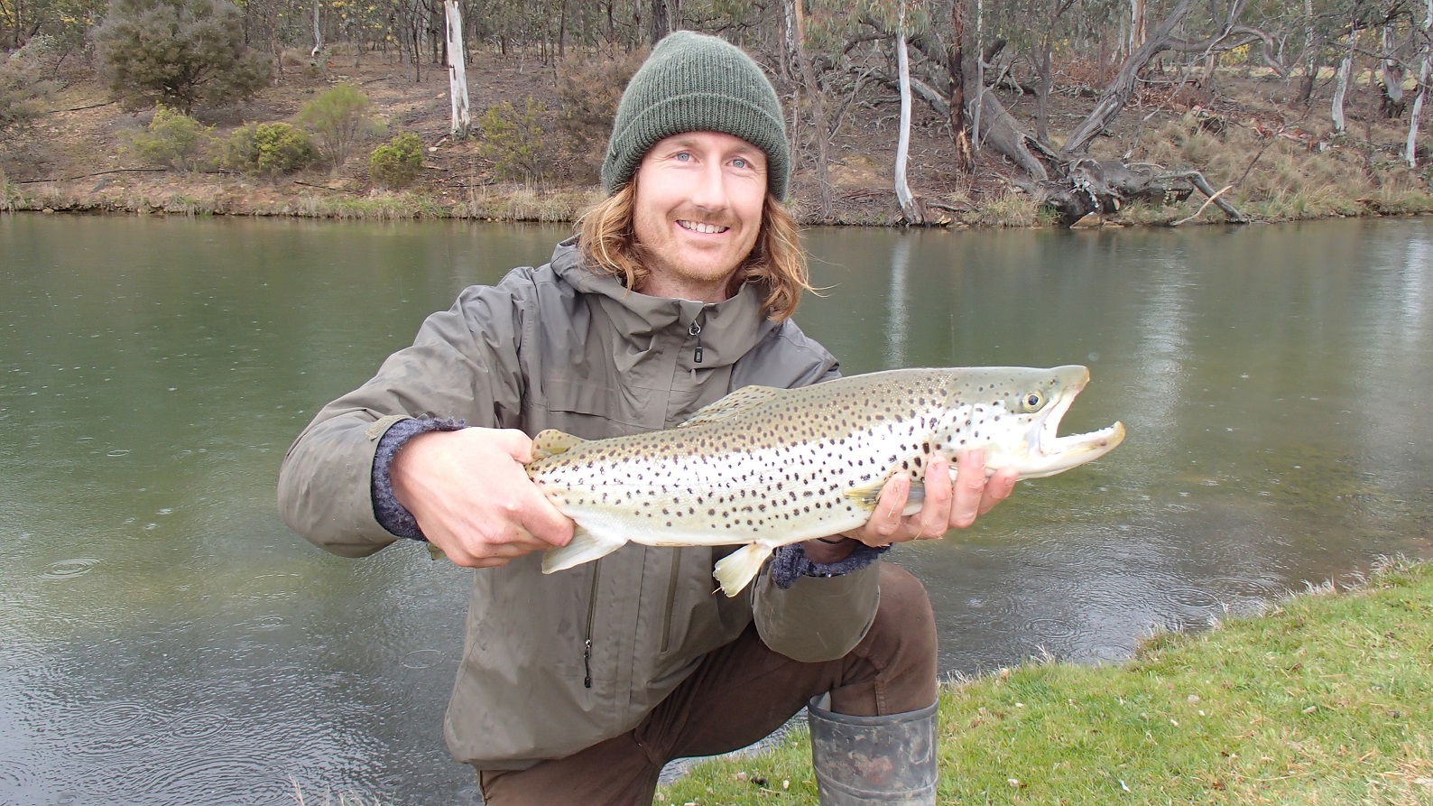Catching big brown trout in the rain