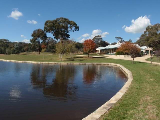 Sunny day with picture of water and the grounds