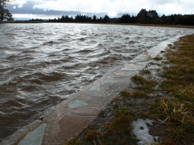 Main lake retaining wall with water to the top